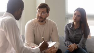 Two couples in a marriage coaching session in Miami