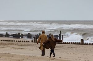 A happy couple by the water