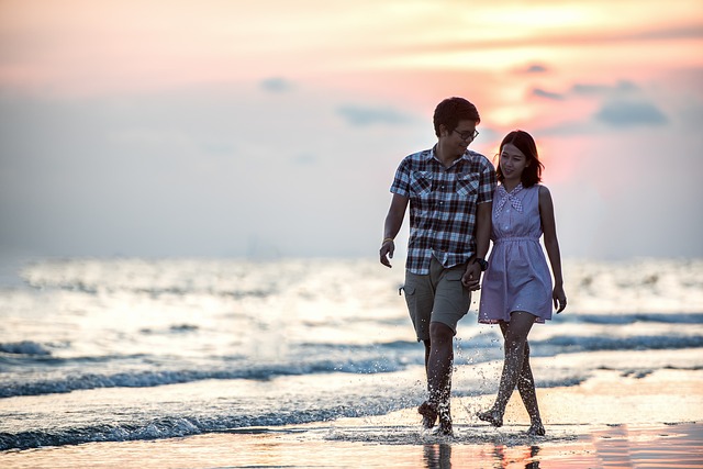 Guidance For Couples: a happy couple walking on the riverside