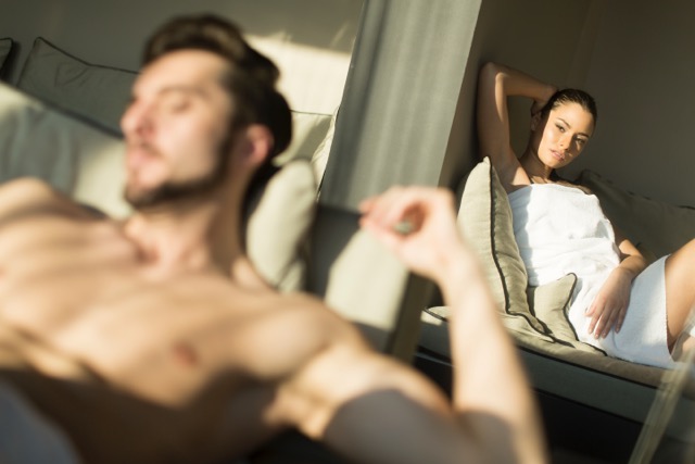 A young couple relaxing together at home