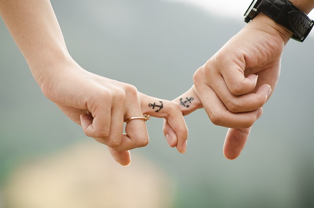 A couple holding hands