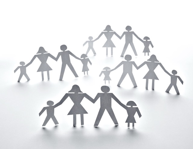 Paper figures on a white background, a picture of unity in a family
