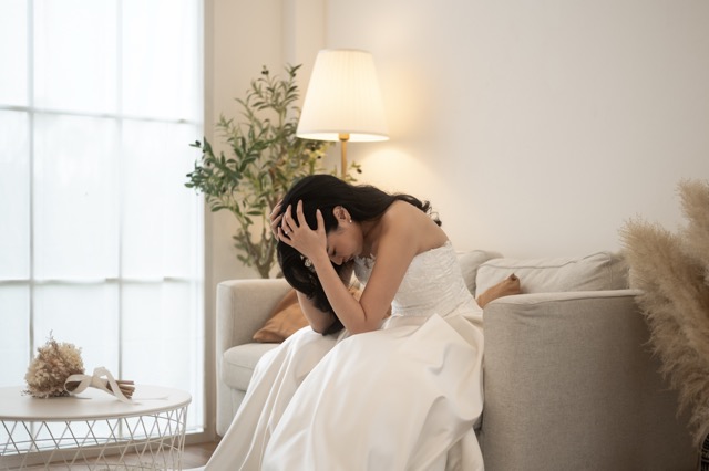 A worried bride arguing with her groom