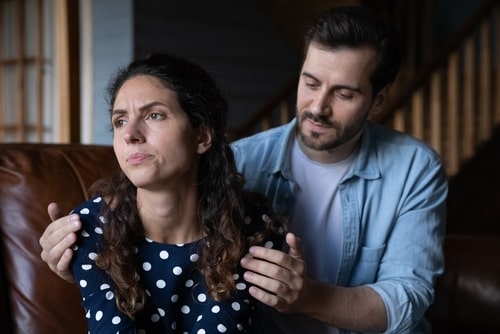 An unhappy married couple after a betrayal