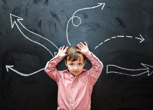 A young child thinking something through