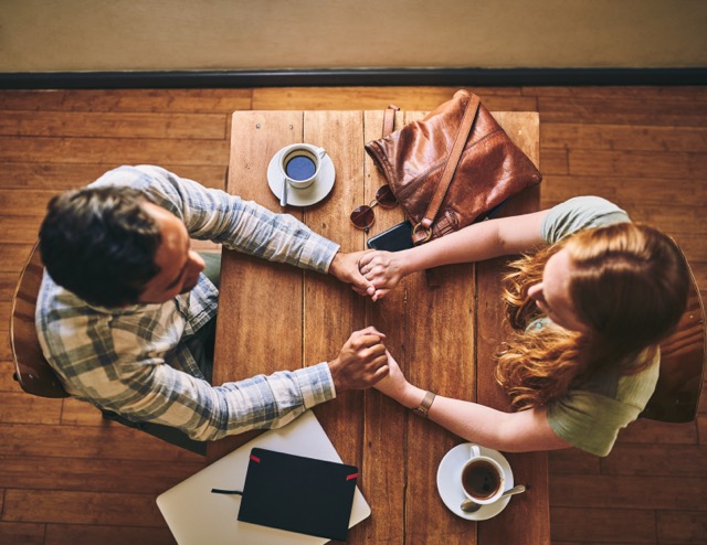 A couple out together at a restaurant