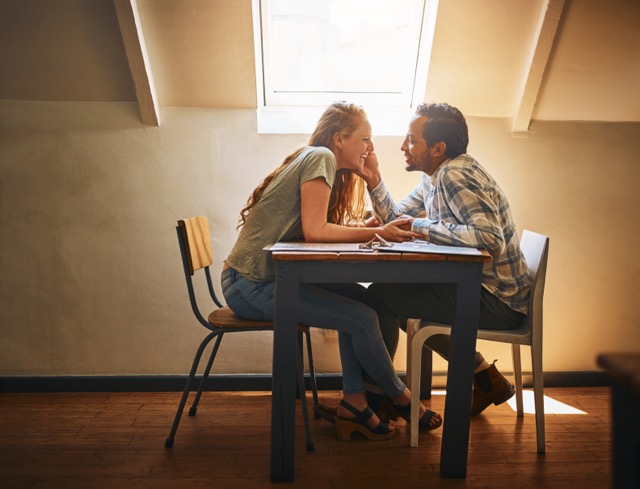 A young couple spending time together at a cafe