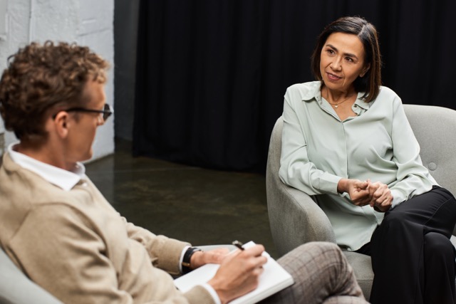 Save Marriage: A journalist in a cozy studio engages with a specialist, uncovering her insights and professional expertise.
