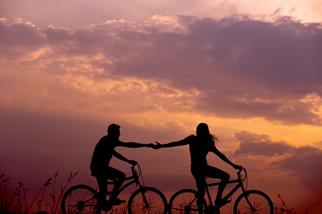 Guidance For Couples: two happy couple Cycling in the afternoon