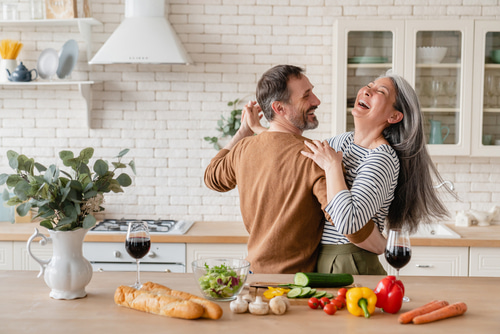 How To Improve Communication In A Relationship: Two happy couple are laughing 