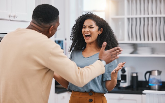 Divorce, stress and angry couple screaming in a kitchen for debt, mistake or commitment doubt at ho.