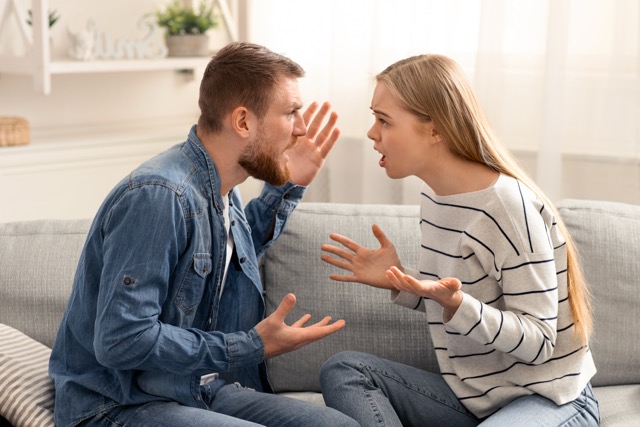 Relationship problem. Emotional man and woman quarreling because of family money