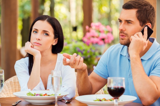 Two marriage couple pictures in a restaurant. 