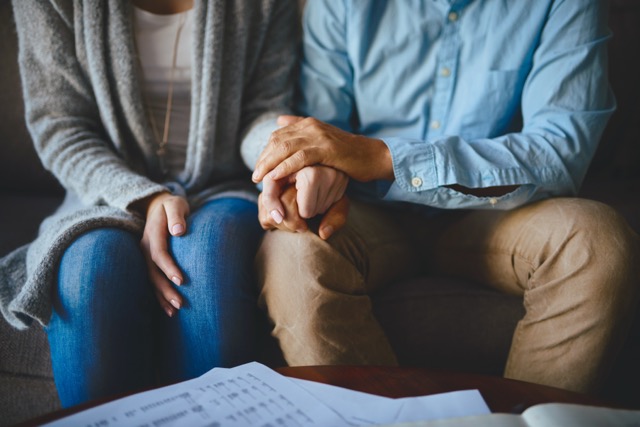 Let love be your greatest source of support. Closeup shot of a couple holding hands in comfort