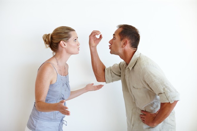  Marriage couple is quarreling about their problem.