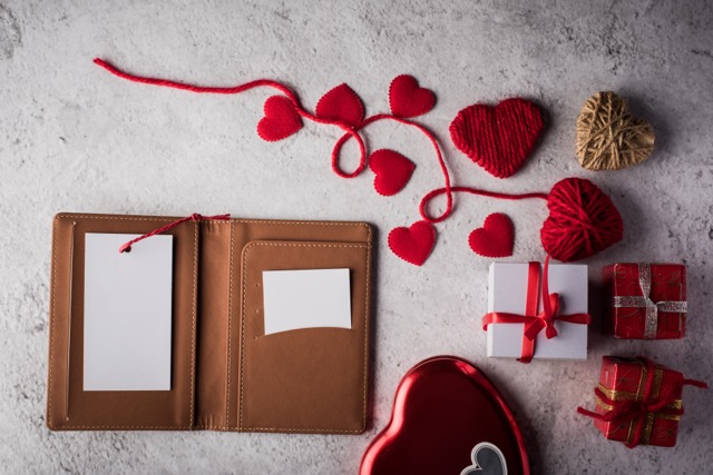 Top view Blank white card on wallet and heart gift