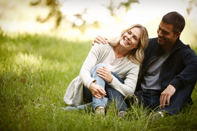 Marriage couples are taking a quiet moment to laugh.