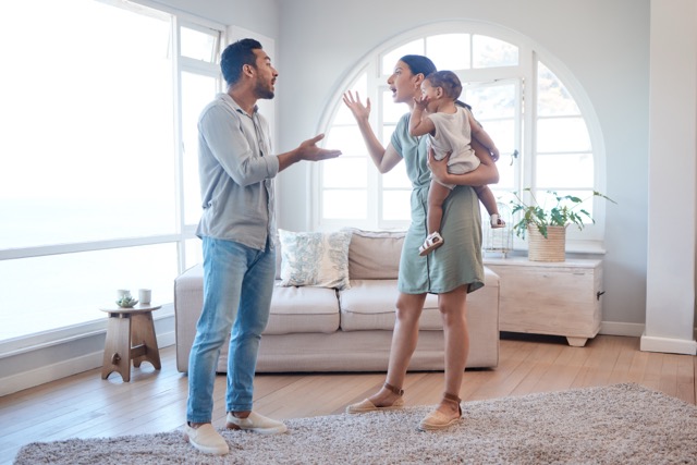 Parenting Conflicts: a married couple is confilting with a little child. 